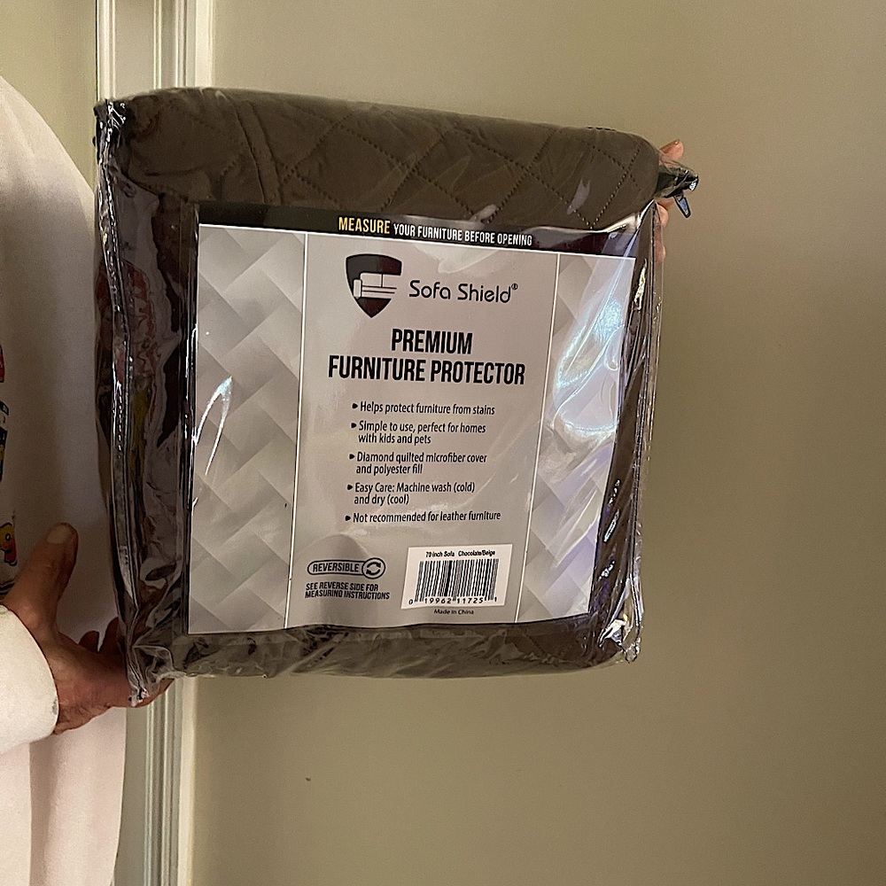 Sofa Shield reversible couch cover.